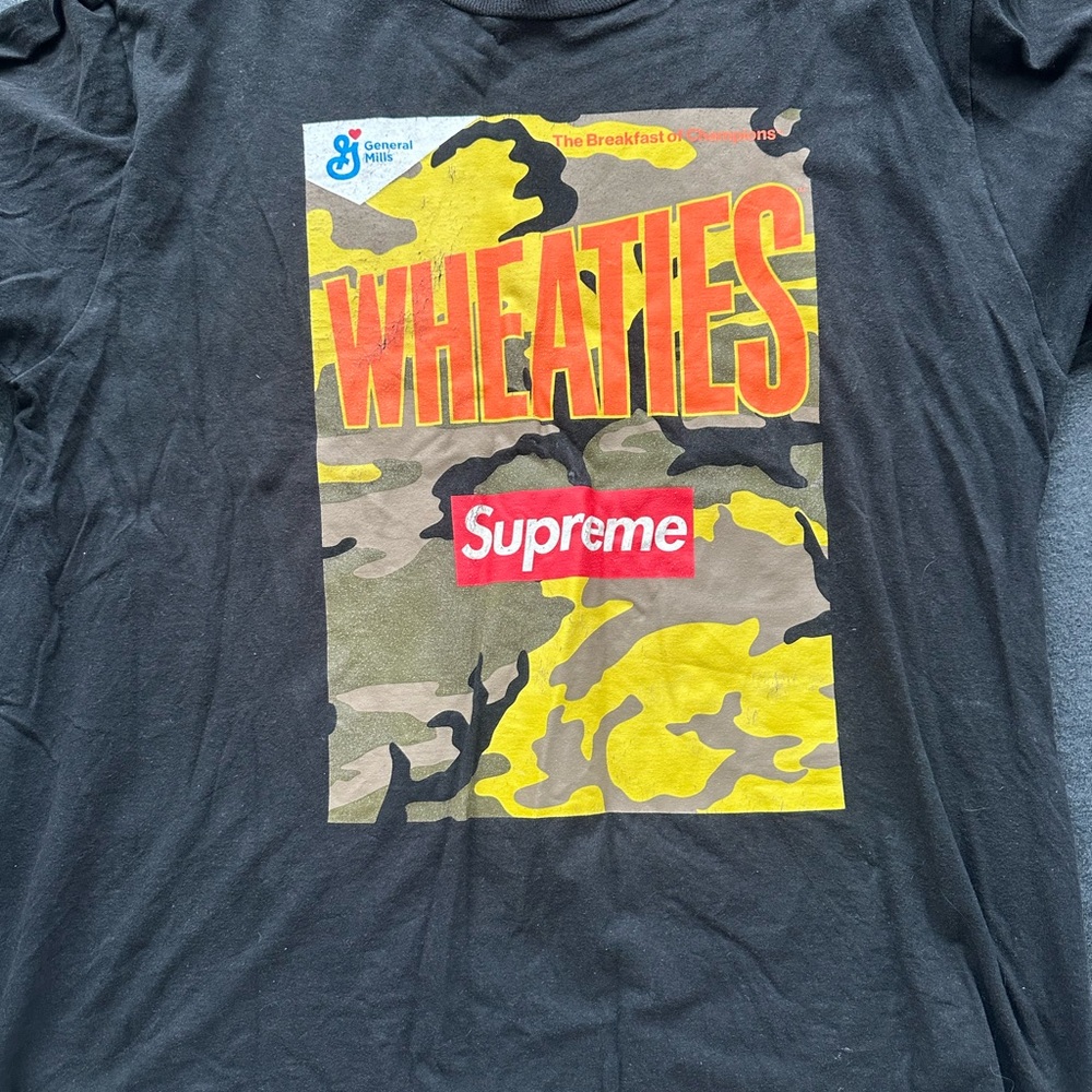 Supreme Black T-Shirt with Wheaties Camo Graphic
